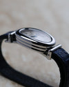 Side profile of the Cartier Baignoire Biplan ref. 2295 highlighting its layered double-tier white gold case construction.