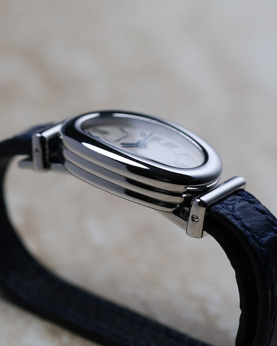 Side profile of the Cartier Baignoire Biplan ref. 2295 highlighting its layered double-tier white gold case construction.