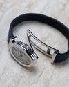 Cartier Baignoire Biplan ref. 2295 photographed with its case opened to reveal the integrated hinge system.
