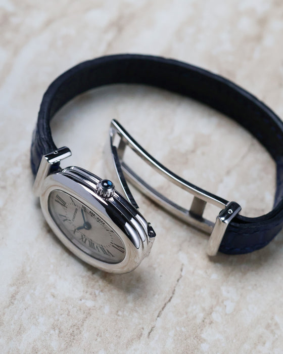 Cartier Baignoire Biplan ref. 2295 photographed with its case opened to reveal the integrated hinge system.