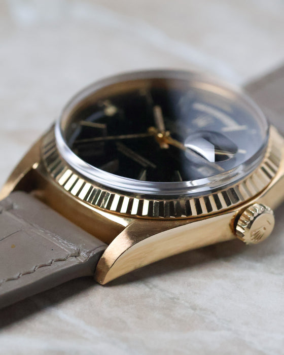 Opposite side profile of the Rolex Day-Date 1803 highlighting the fluted bezel and case shape.