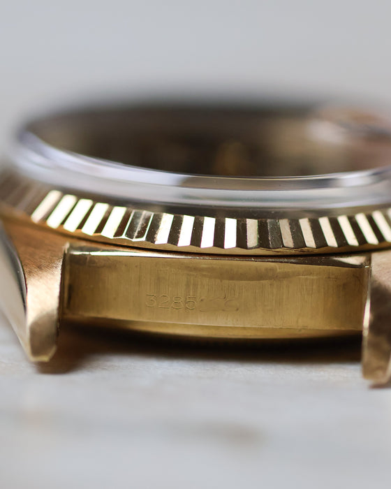 Reference engraving between the lugs of the Rolex Day-Date 1803 showing the registered design and reference number.