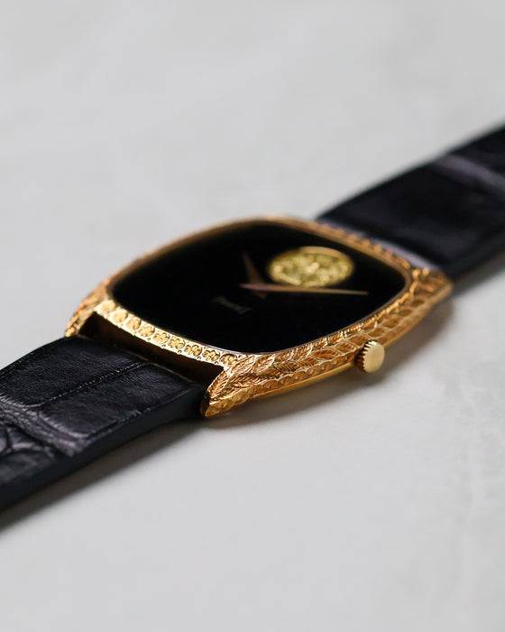 Low-angle profile of the Piaget Ref. 9591 highlighting the sculpted gold case and crown.