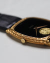 Close-up of the Piaget Ref. 9591 case flank highlighting the intricate hand-engraved goldwork.