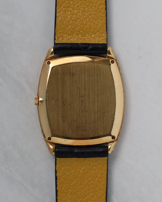 Caseback view of the Piaget Ref. 9591 showing the solid gold rear case.
