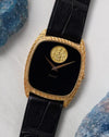 Three-quarter view of the Piaget Ref. 9591 highlighting the engraved case and onyx dial.