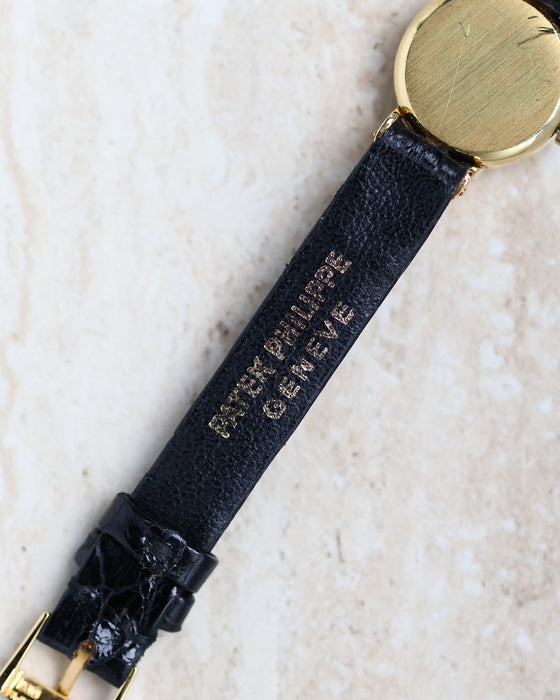 Patek Philippe Ref. 3017 signed original strap detail with Geneva stamping visible.