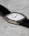 Opposite side profile of the Rolex Cellini Ref. 4170 displaying the faceted case design and bezel finishing.