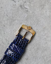 Original signed Girard-Perregaux gold-plated pin buckle showing natural wear to the plating.