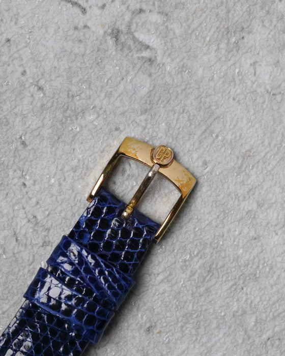 Original signed Girard-Perregaux gold-plated pin buckle showing natural wear to the plating.