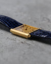 Three-quarter view of the 18K yellow gold Girard-Perregaux rectangular dress watch.