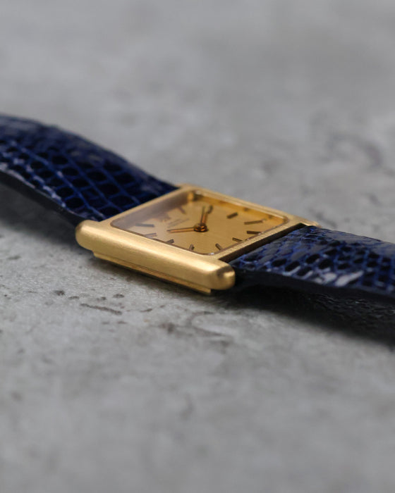 Three-quarter view of the 18K yellow gold Girard-Perregaux rectangular dress watch.