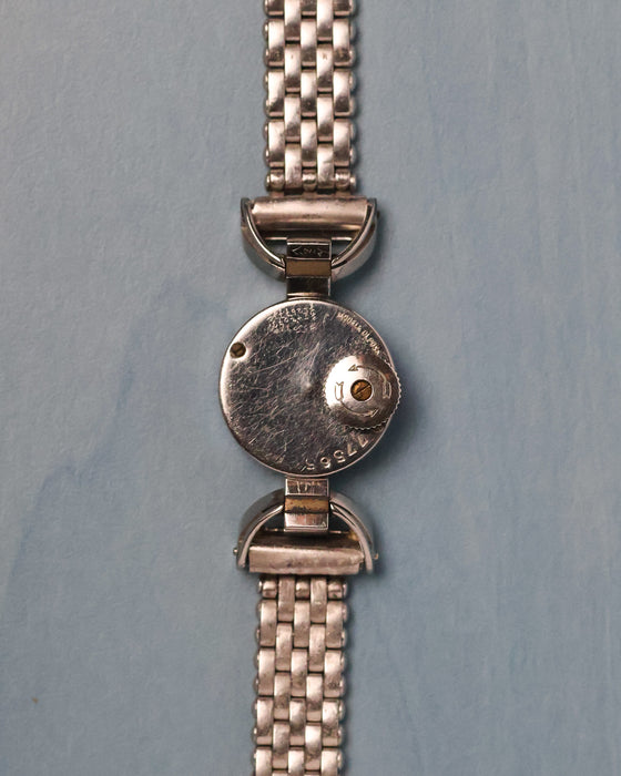 Caseback of the vintage Jaeger-LeCoultre showing its distinctive rear-mounted winding and setting crown.
