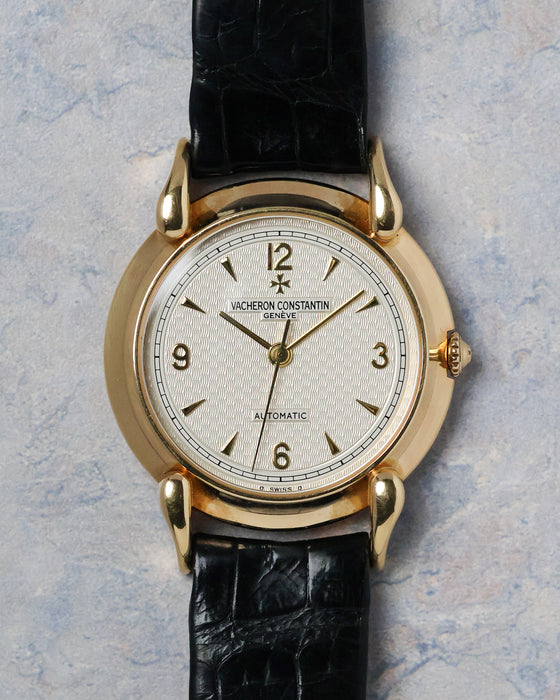 Front view of the Vacheron Constantin Historiques 48003 with engine-turned silver dial and applied gold markers.