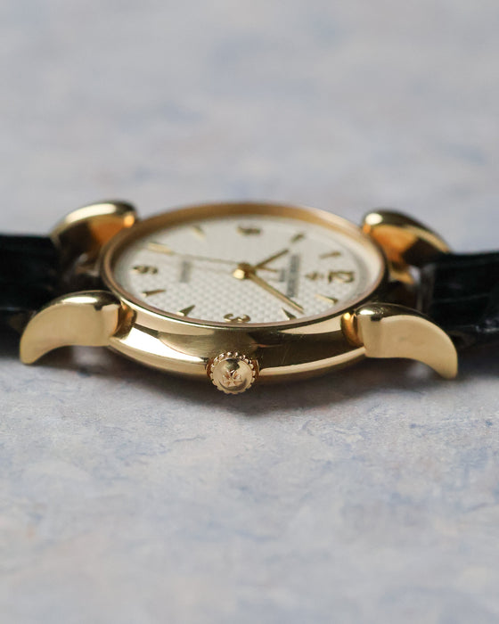 Crown-side profile of the Vacheron Constantin Historiques 48003 showing the signed crown and sculpted lugs.