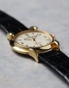 Angled view of the Vacheron Constantin Historiques 48003 highlighting the yellow gold case and curved lug design.