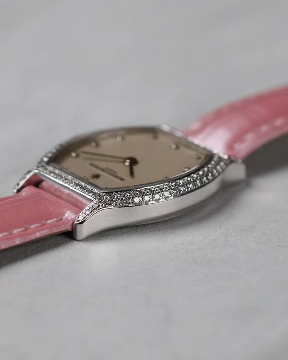 Opposite side profile of the polished white gold case.