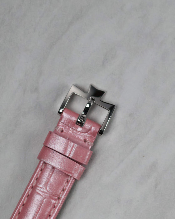 Close-up of the original 18k white gold Vacheron Constantin pin buckle featuring the polished Maltese Cross design.