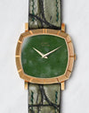 Front view of the Piaget Reference 12427 featuring a green jade dial in an 18k yellow gold case.