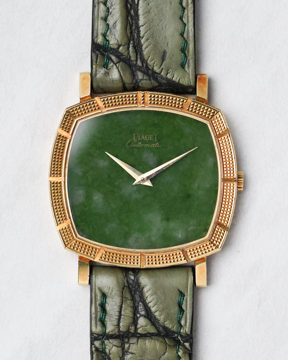 Front view of the Piaget Reference 12427 featuring a green jade dial in an 18k yellow gold case.