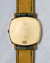 Caseback of the Piaget Reference 12427 showing the brushed 18k yellow gold back and hallmarks.