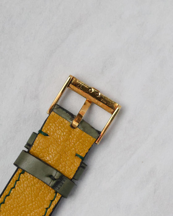 Reverse view of the original 18k yellow gold Piaget buckle on the Reference 12427 strap.