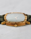 Low-angle profile of the Piaget Reference 12427 showing the textured bezel and crown.