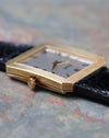 Angled side view of the Piaget Protocole Jumbo Ref. 90154 highlighting the signed crown and stepped case.