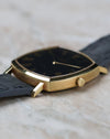 Side profile of the Vacheron Constantin Ref. 7390 displaying its slim 18K yellow gold case and signed crown.