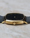 Low front profile of the Vacheron Constantin Ref. 7390 showing the thin case and black dial.