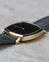 Side angle of the Vacheron Constantin Ref. 7390 showing the elegant lugs and slim case construction.