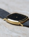 Opposite side profile of the Vacheron Constantin Ref. 7390 emphasizing the brushed 18K yellow gold case and floating lugs.
