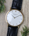 Vacheron Constantin Ref. 7811 with white dial, applied baton markers and black leather strap.