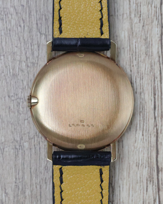 Case back of Vacheron Constantin Ref. 7811 in 18k yellow gold showing serial number and gold hallmarks.