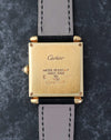 Caseback of the Cartier Tank Obus Ref. 1630 showing the 18K gold case and hallmarks.