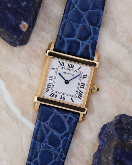 Angled front view of the Cartier Tank Chinoise Ref. 81051 highlighting the rectangular case and Roman numeral dial.