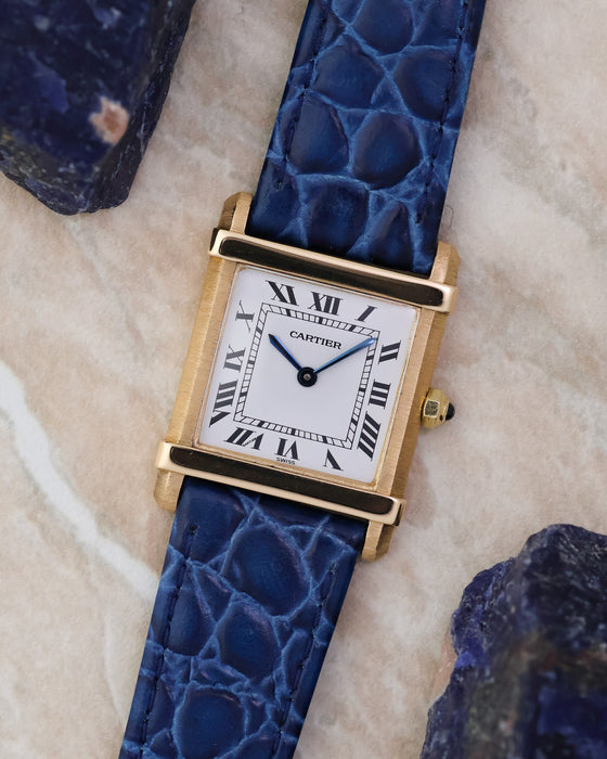 Angled front view of the Cartier Tank Chinoise Ref. 81051 highlighting the rectangular case and Roman numeral dial.