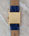 Caseback of the Cartier Tank Chinoise Ref. 81051 in 18K yellow gold with Cartier engravings and brushed finish.