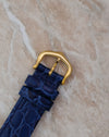 Close-up of the Cartier gold-plated buckle fitted to the blue leather strap for the Tank Chinoise Ref. 81051.