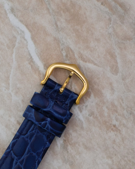 Close-up of the Cartier gold-plated buckle fitted to the blue leather strap for the Tank Chinoise Ref. 81051.