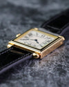 Side profile of the Cartier Tank Obus Ref. 1630 showing the rounded Obus lugs and enamel bezel.