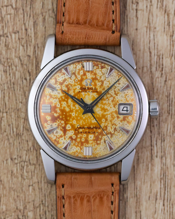 Front view of the Omega Seamaster Calendar Ref. 2849 featuring a heavily patinated tropical dial and date display at 3 o'clock.