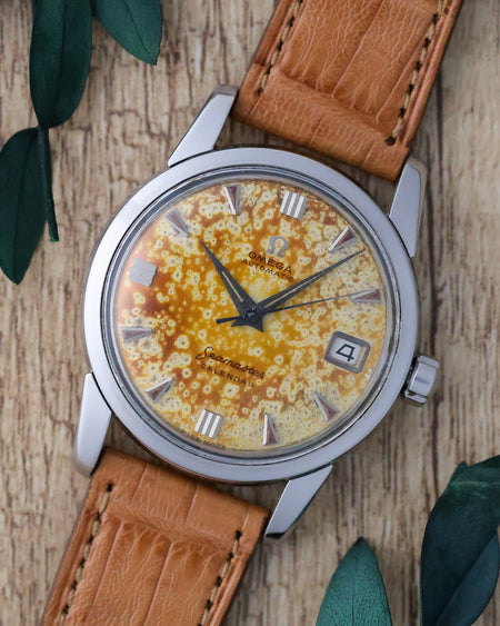 Three-quarter view of the Omega Seamaster Calendar Ref. 2849 showcasing the unique tropical dial and polished stainless steel case.