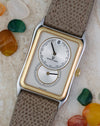 Angled front view of the Universal Genève Jump Hour Regulator Ref. 225.125 showing the jump hour display and two-tone case.