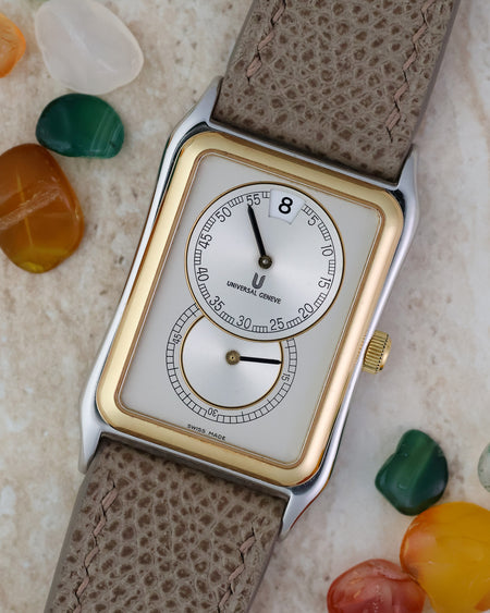 Angled front view of the Universal Genève Jump Hour Regulator Ref. 225.125 showing the jump hour display and two-tone case.