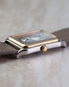 Side profile of the Universal Genève Jump Hour Regulator Ref. 225.125 highlighting the slim case and stepped 18k gold bezel.
