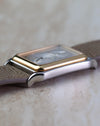 Opposite side profile of the Universal Genève Jump Hour Regulator Ref. 225.125 showing the polished steel case and stepped bezel.