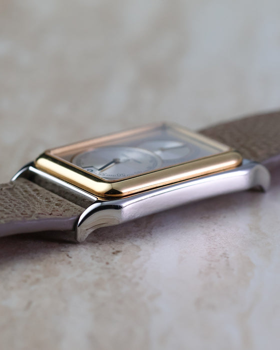 Opposite side profile of the Universal Genève Jump Hour Regulator Ref. 225.125 showing the polished steel case and stepped bezel.