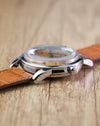 Side profile of the Omega Seamaster Calendar Ref. 2849 highlighting the signed Omega crown and domed crystal.