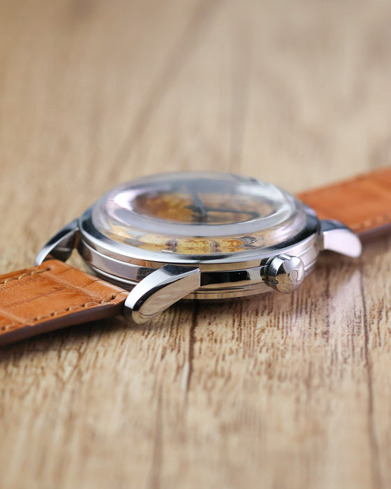 Side profile of the Omega Seamaster Calendar Ref. 2849 highlighting the signed Omega crown and domed crystal.